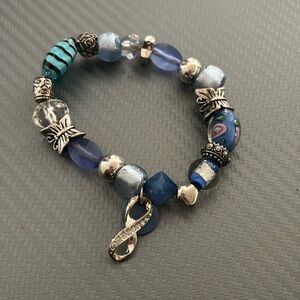 5/$10 
Breast cancer bracelet